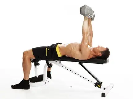 A man exercising with dumbbells