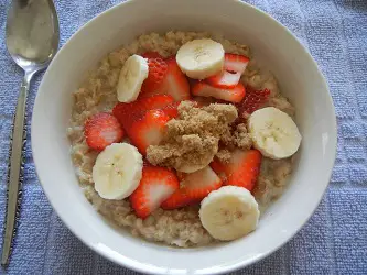healthy breakfast - oatmeal with banana and strawberry