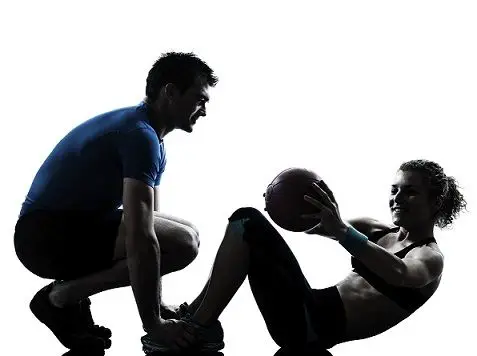 man and woman exercising