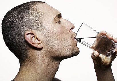 man drinking water