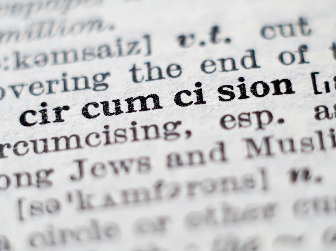 Dictionary definition of word circumcision. Selective focus.