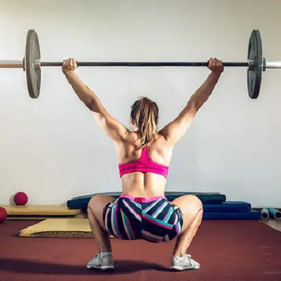 woman lifting weights