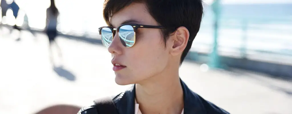 long undercut pixie cut with choppy ends for straight dark brown hair