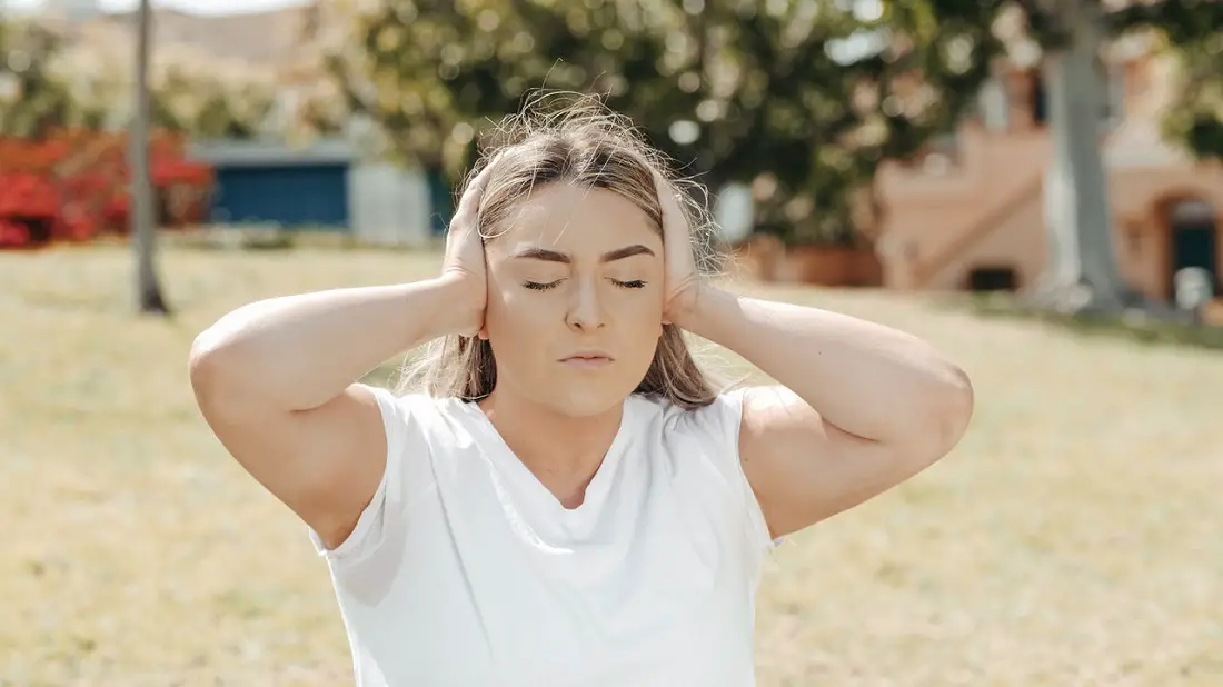 woman-ears-covered