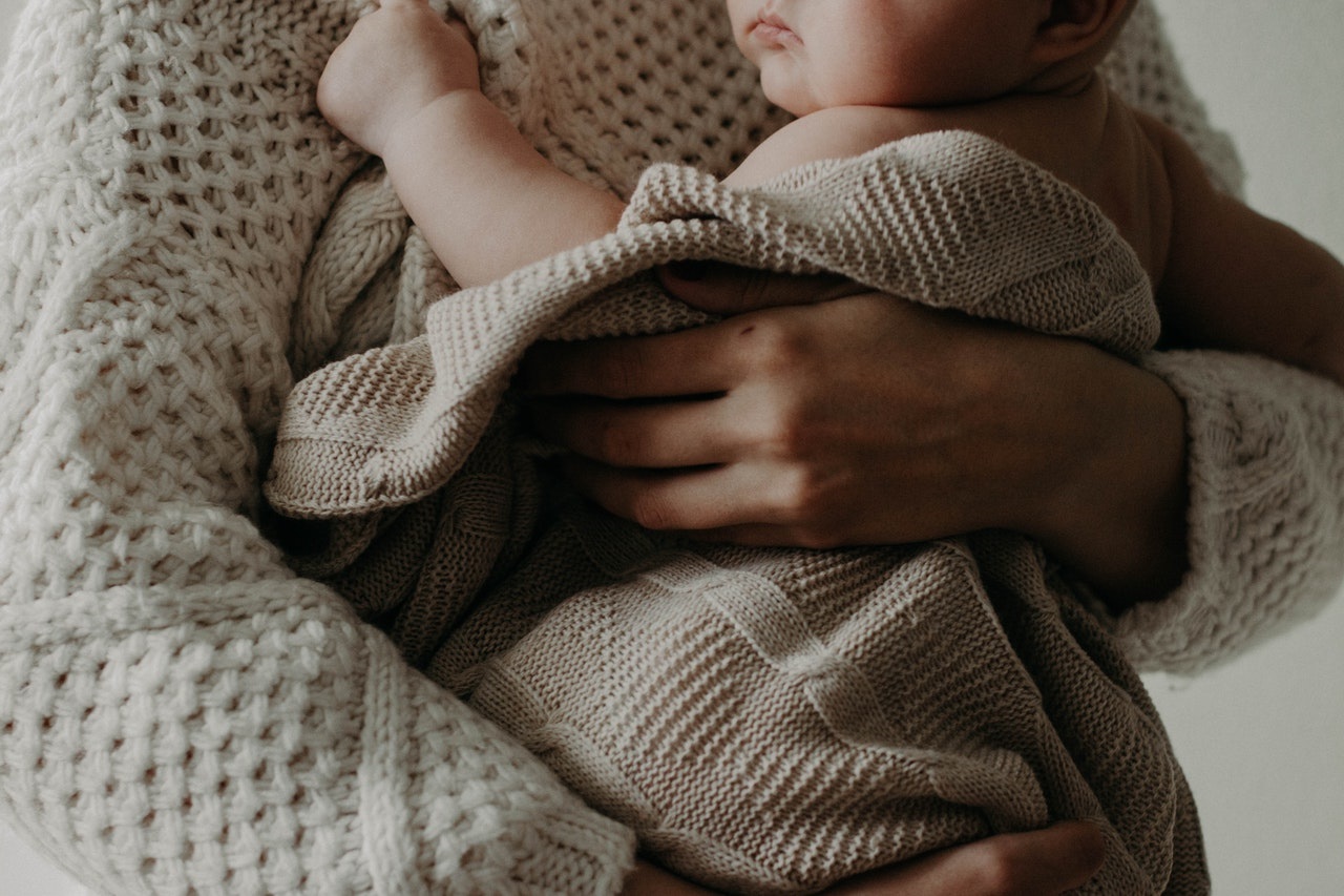 woman-holding-baby