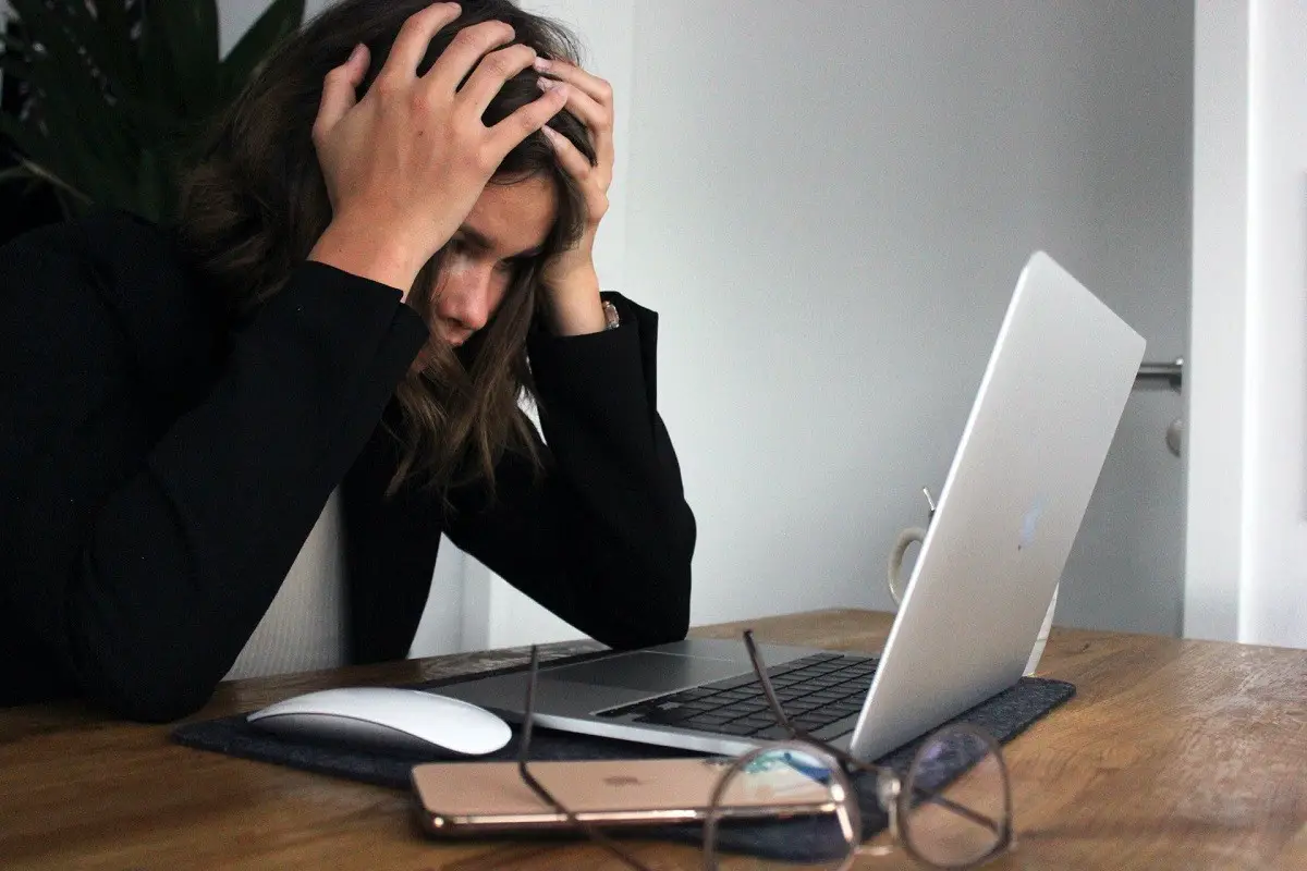 woman-work-stress-black-dress